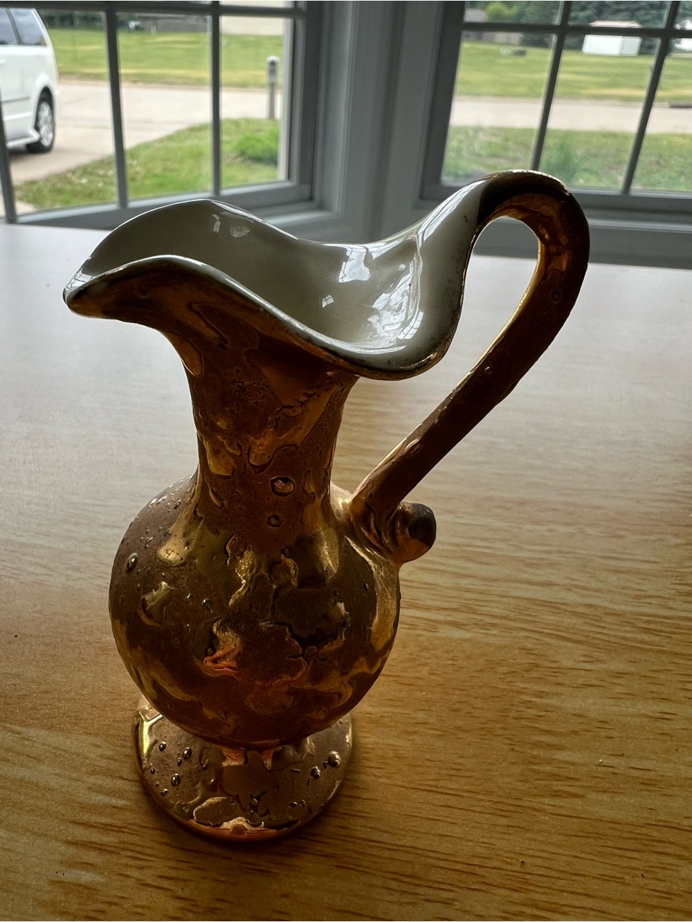 Gold-Tone Ceramic Pitcher with White Interior